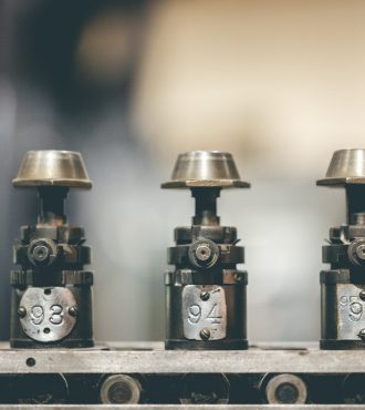 A selective focus shot of numbered engine parts